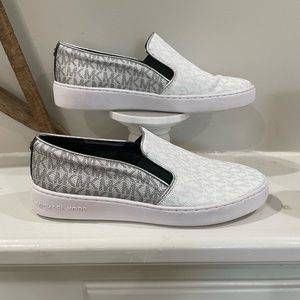 - Michael Kors slip ons.